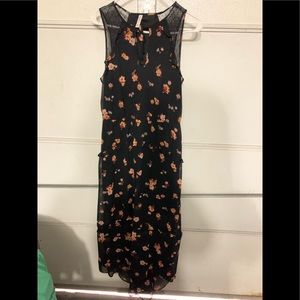 Pretty long dress. Sheer sleeves. Sheer knee down. Long in back then front.